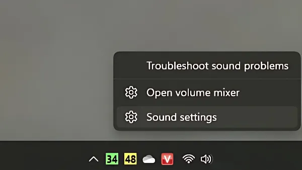 13 cách sửa lỗi laptop Win 11 bị mất âm thanh nhanh chóng Truy cập cài đặt âm thanh Sound settings từ biểu tượng loa trên taskbar Win 11